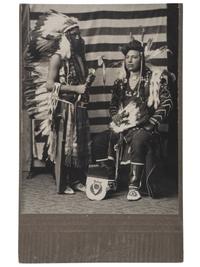 [NATIVE AMERICANS]. A group of 2 photographs of Native American subjects, incl. cyanotype and photograph of subjects in front of blanket.