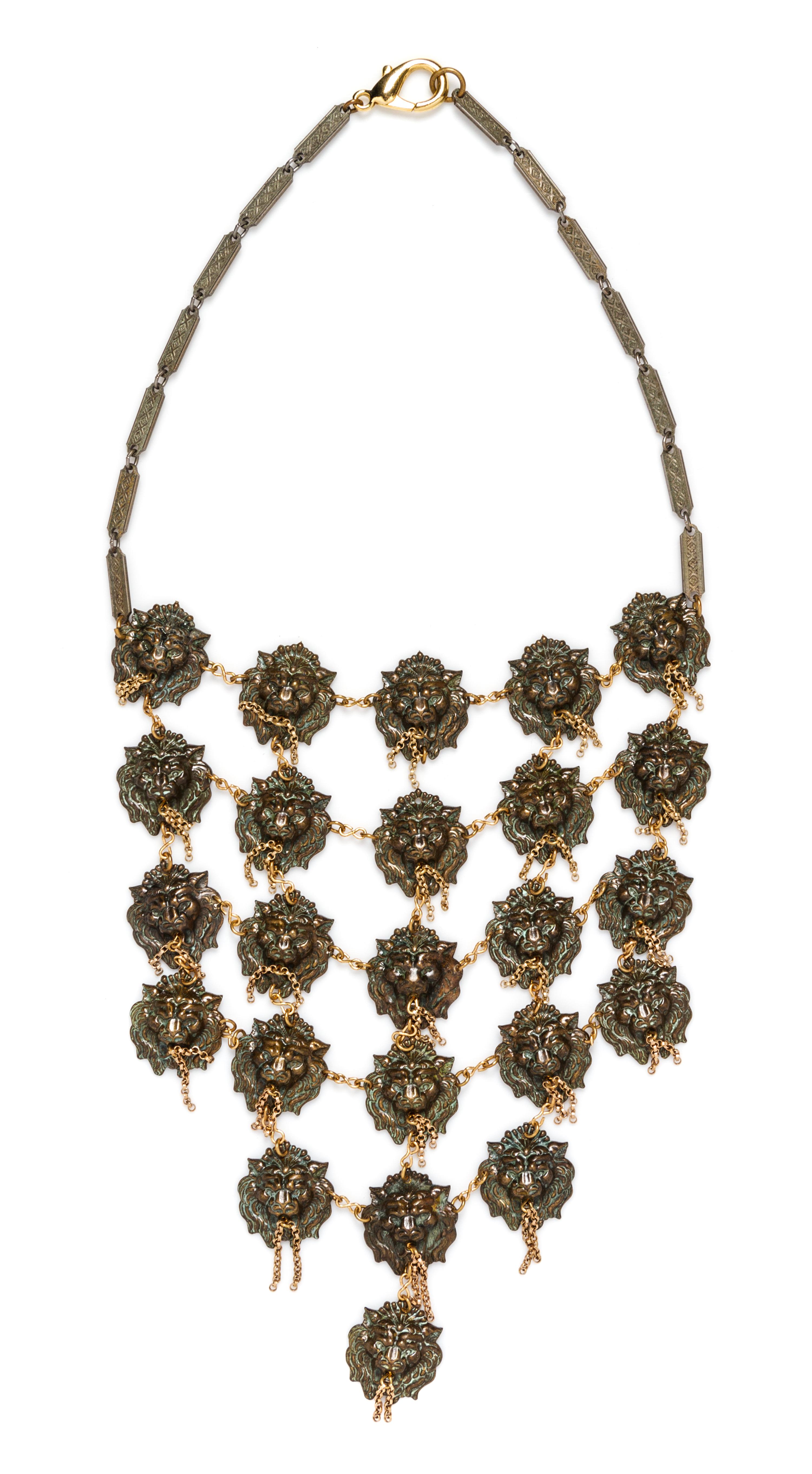A Coppertone Chain Link Lion Head Bib Necklace.