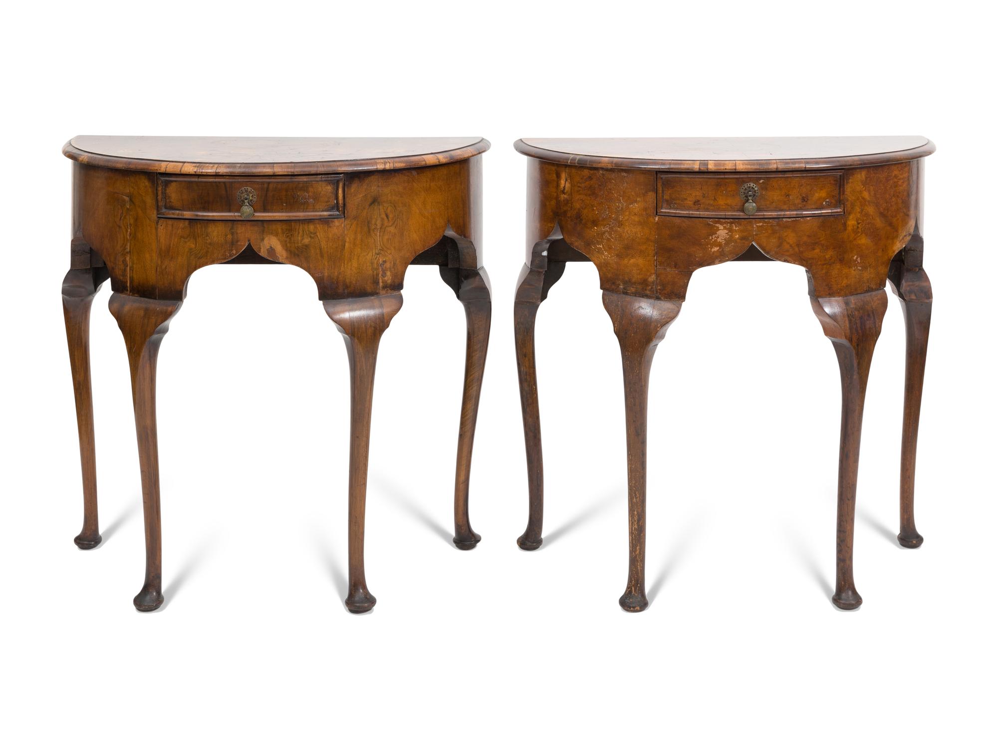 A Pair of Georgian Style Burl Walnut Demilune Console Tables