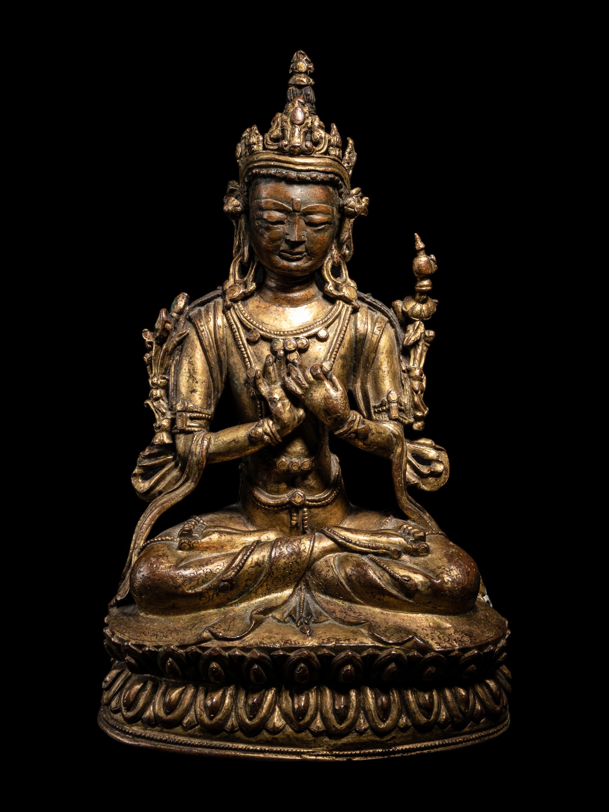 A Tibetan Gilt Bronze Seated Figure of Maitreya
