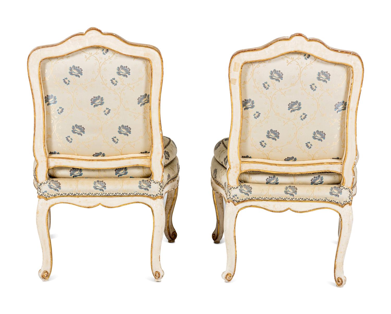 A Pair of Louis XV White-Painted and Parcel-Gilt Side Chairs