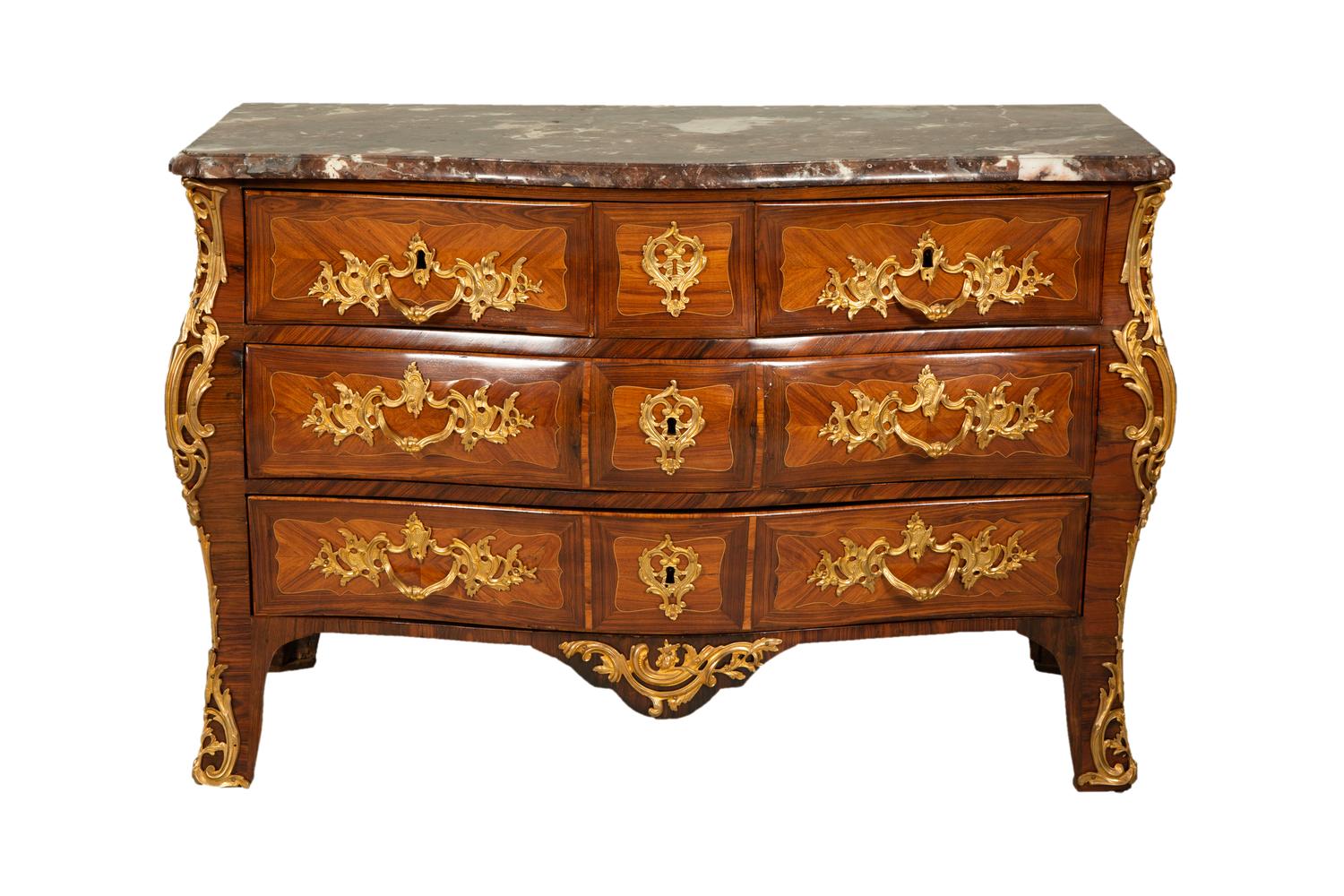 A Louis XV Gilt Bronze Mounted Kingwood and Tulipwood Marble Top Bombé Commode