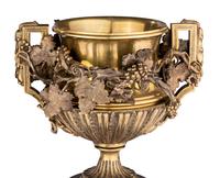 A Pair of Continental Gilt Bronze Urns on Slate Plinths