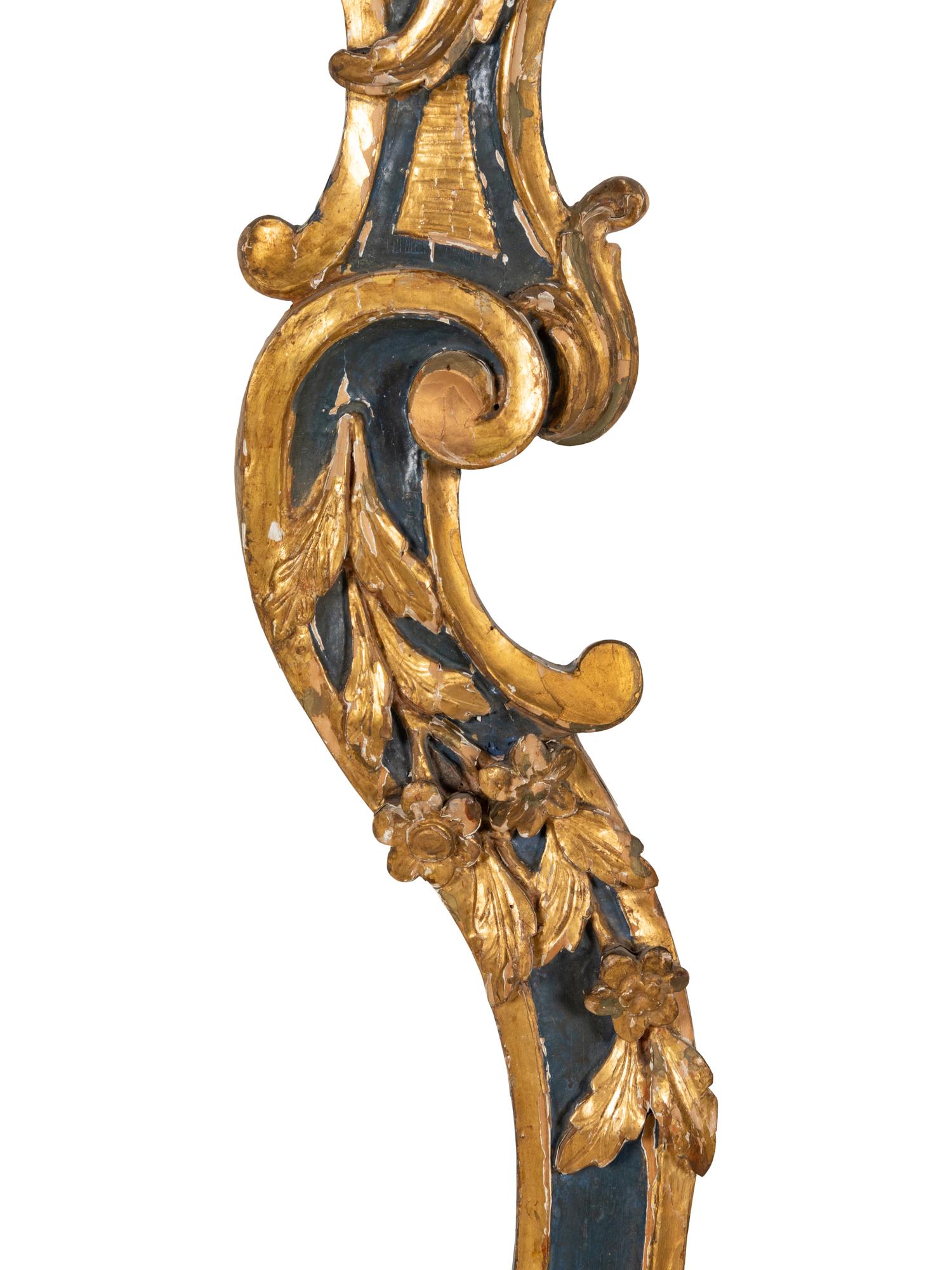 A Pair of Italian Painted and Parcel Gilt Pilasters