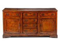 A George III Provincial Parcel Ebonized Sideboard