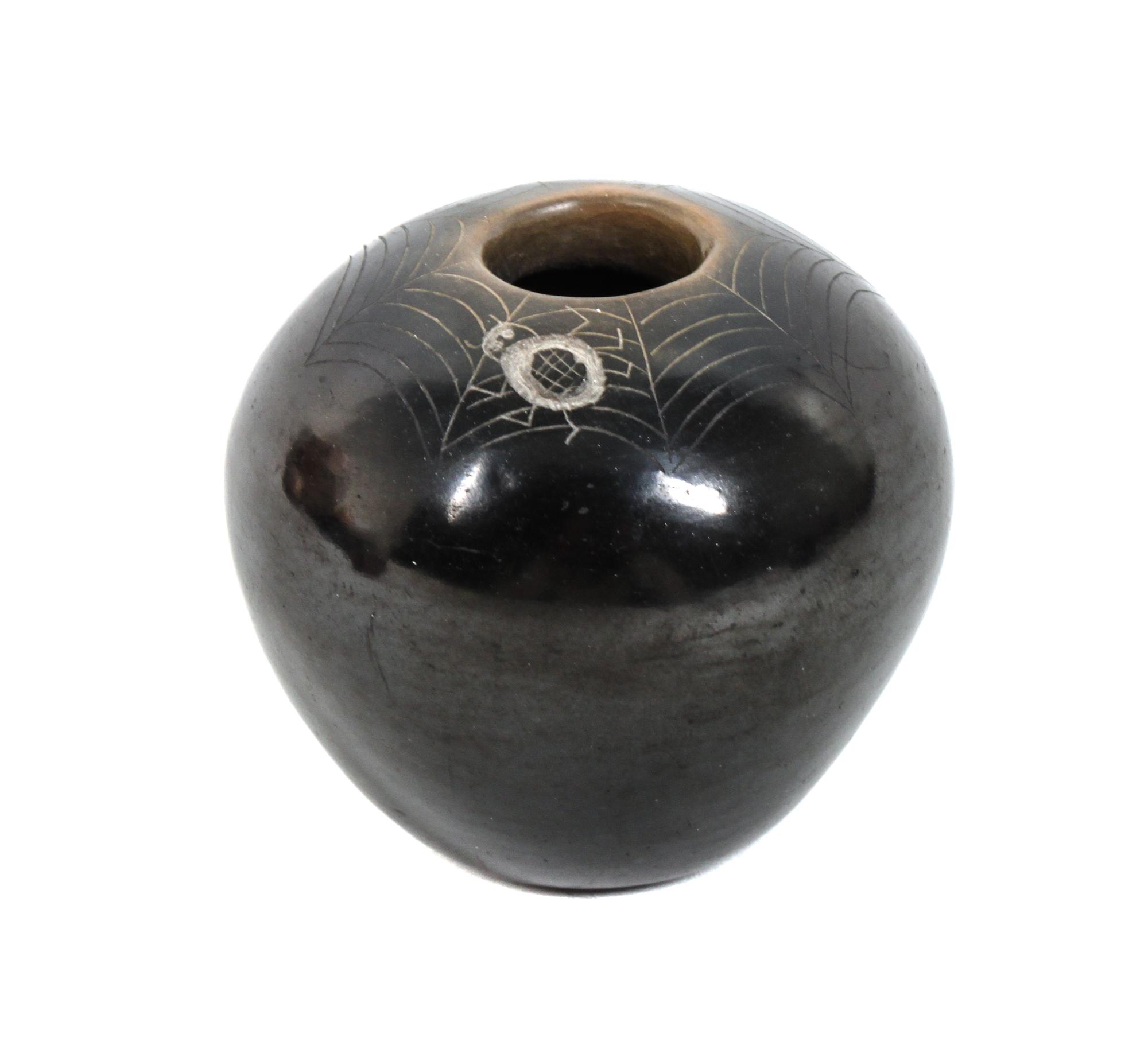 Kathleen Sanchez "Wan Povi" (20th Century), San Ildefonso Height 1 3/4 x diameter 2 inches.