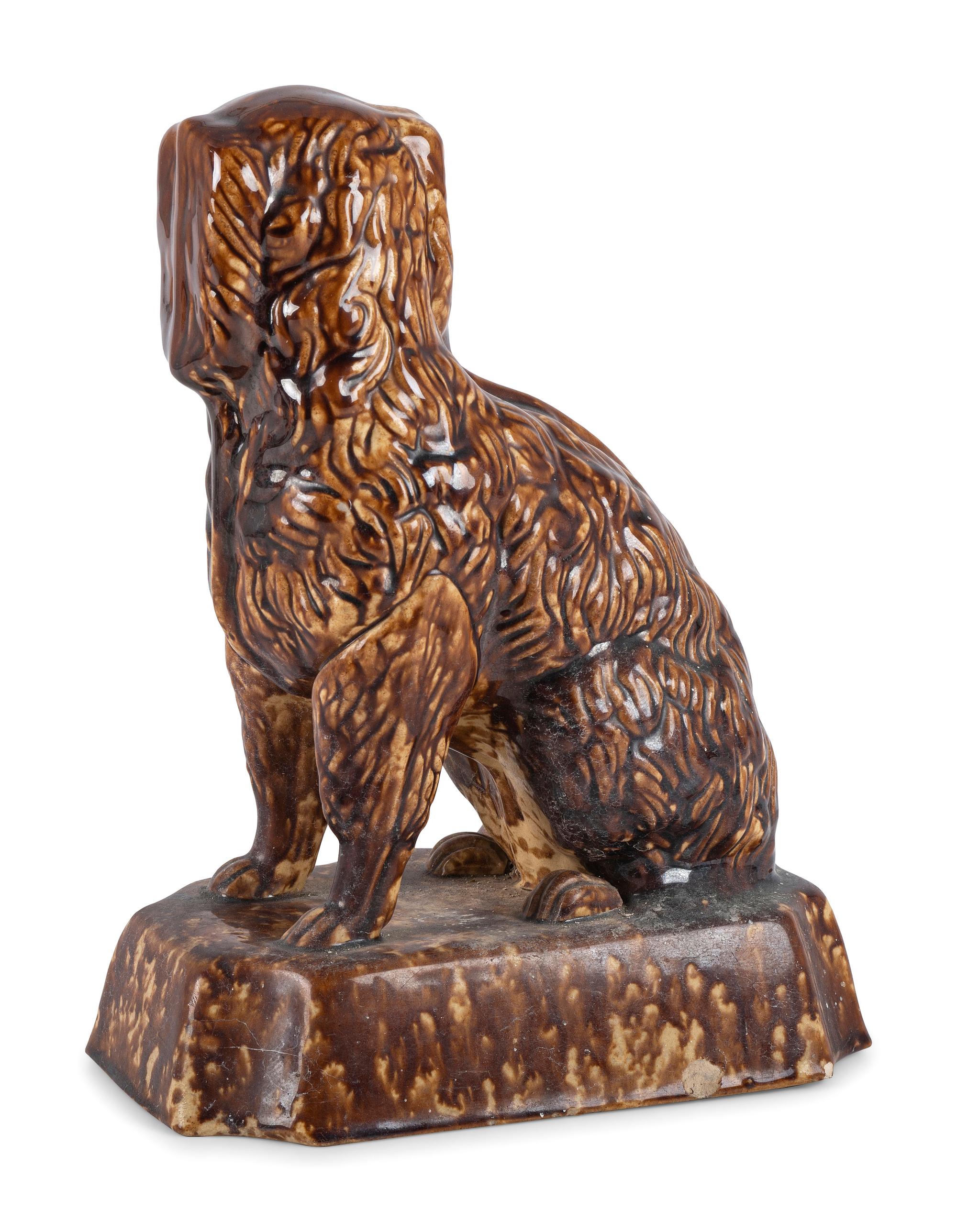 A Rockingham Glazed Yellowware Spaniel, Probably East Liverpool, Ohio