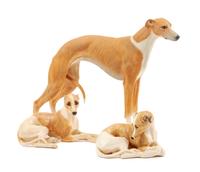 A Group of Three Ceramic Greyhounds Width of widest 9 1/2 inches.