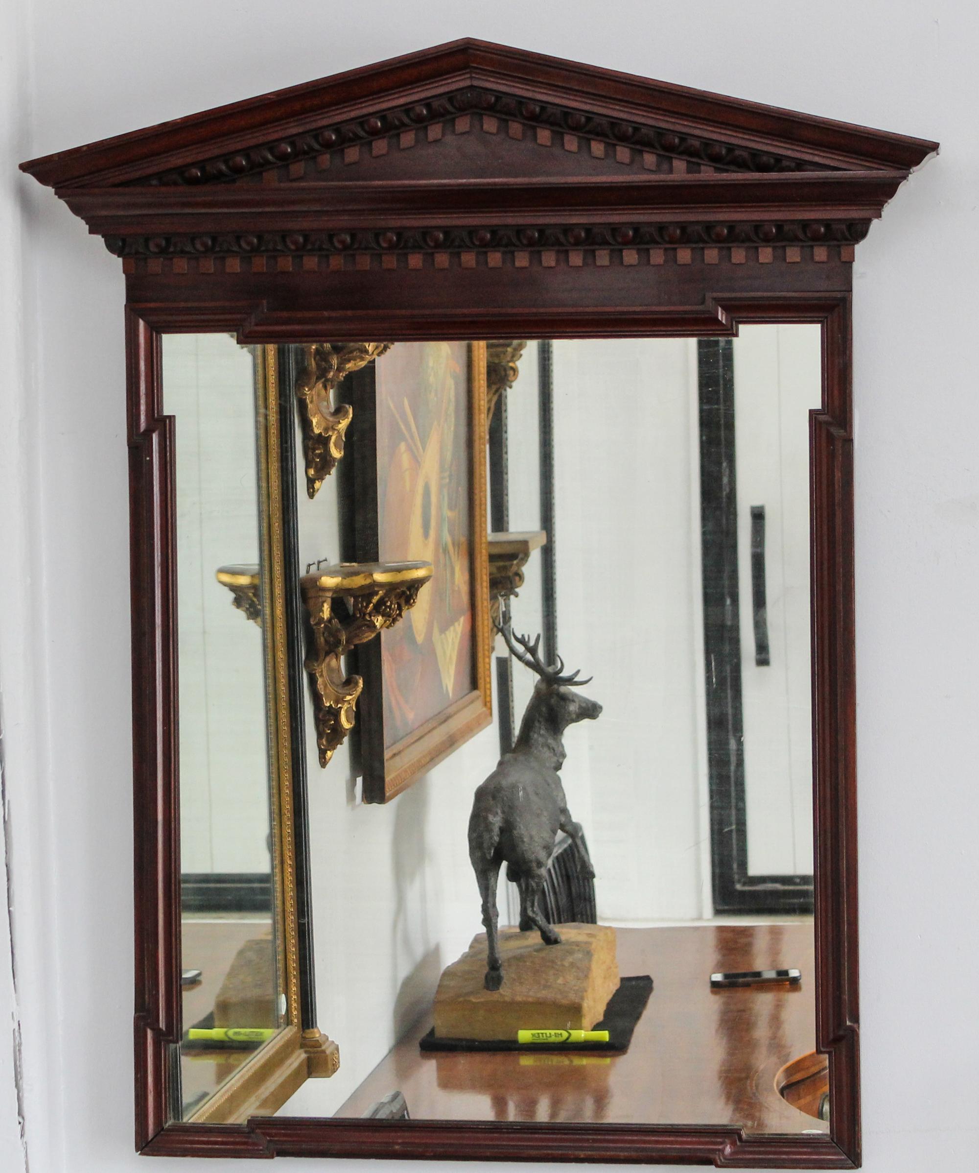 A Neoclassical Style Mahogany Mirror Height 39 inches.