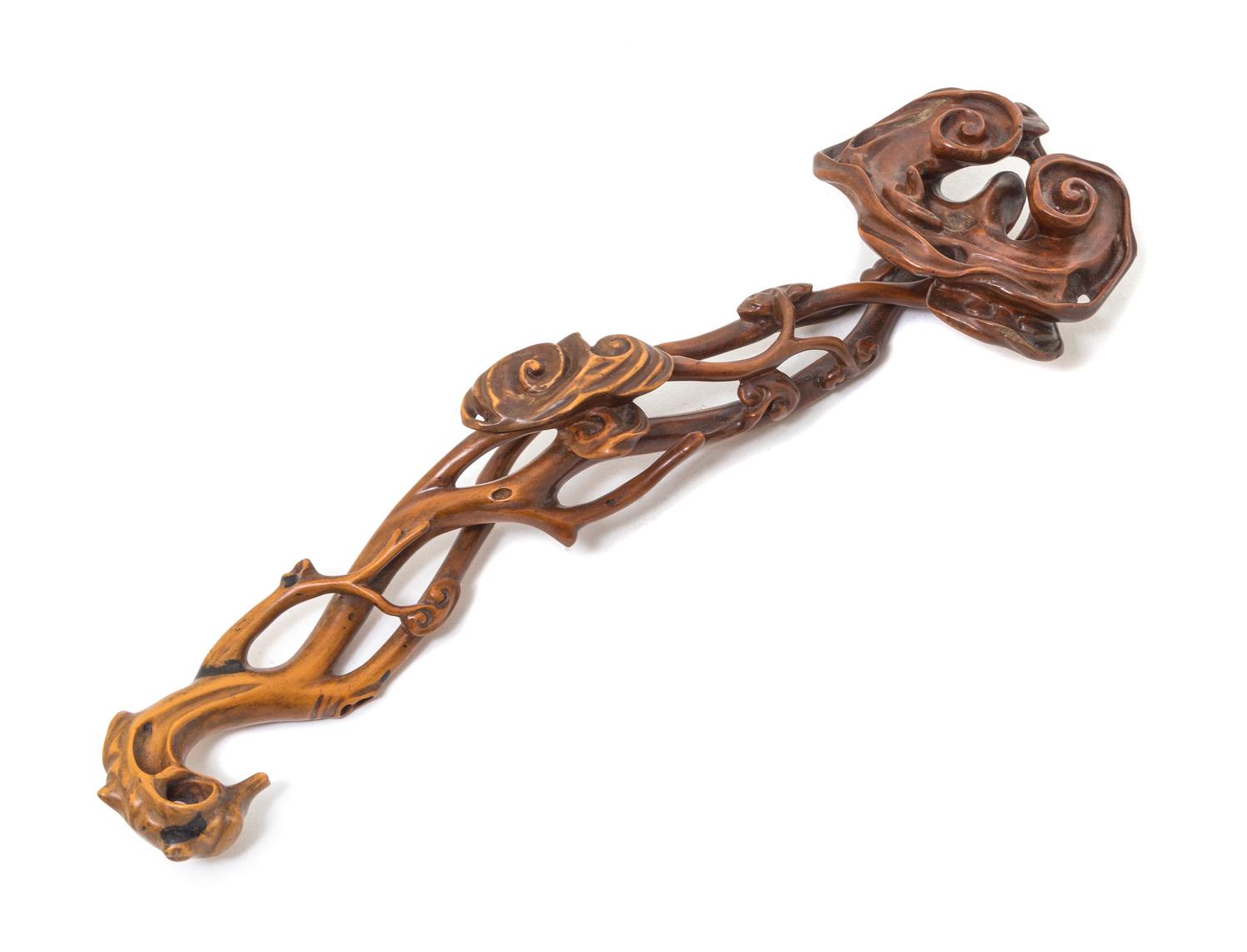 A Carved Boxwood Ruyi Scepter Length 10 1/2 inches.