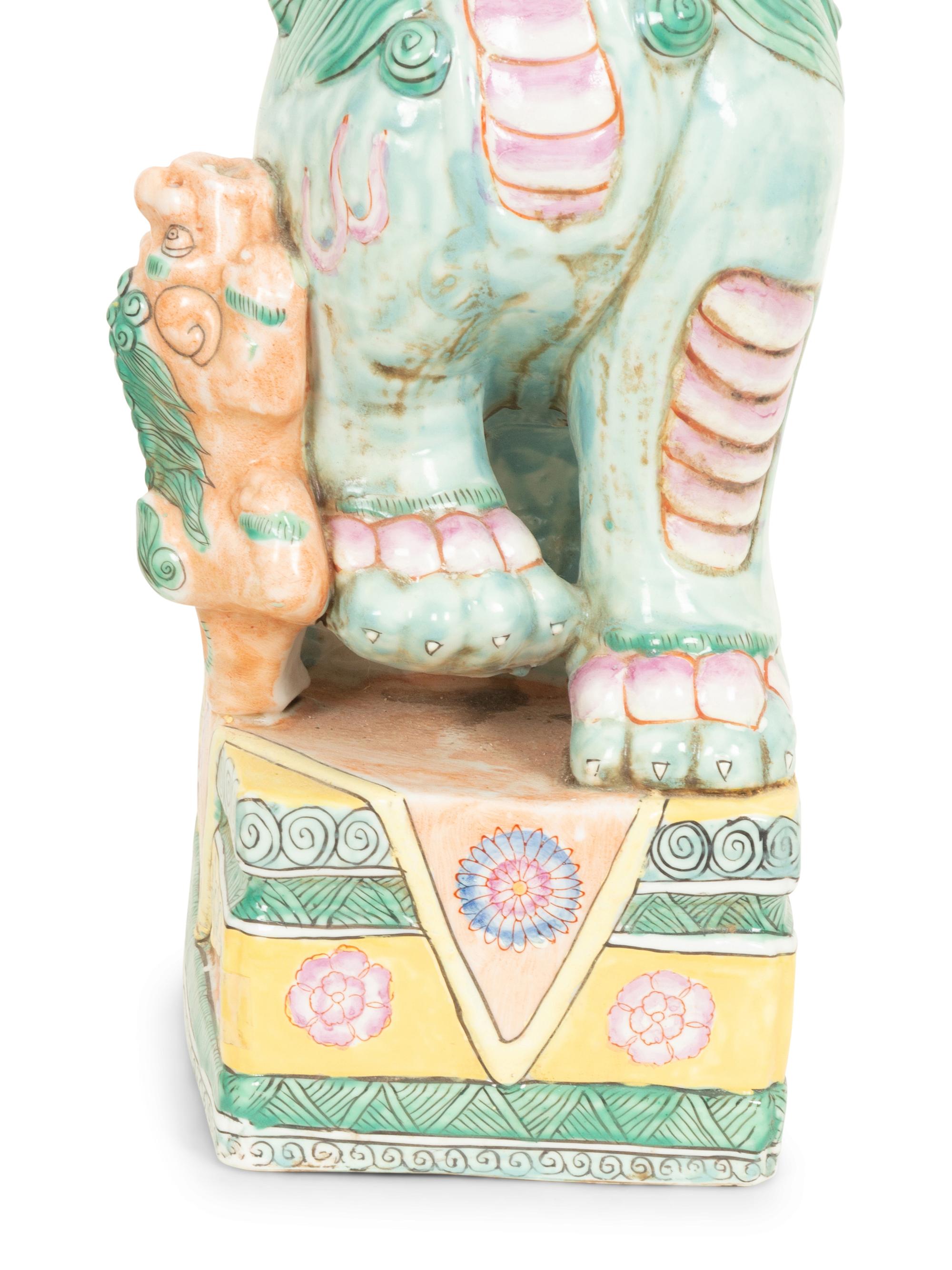 A Pair of Chinese Glazed Ceramic Seated Foo Lions