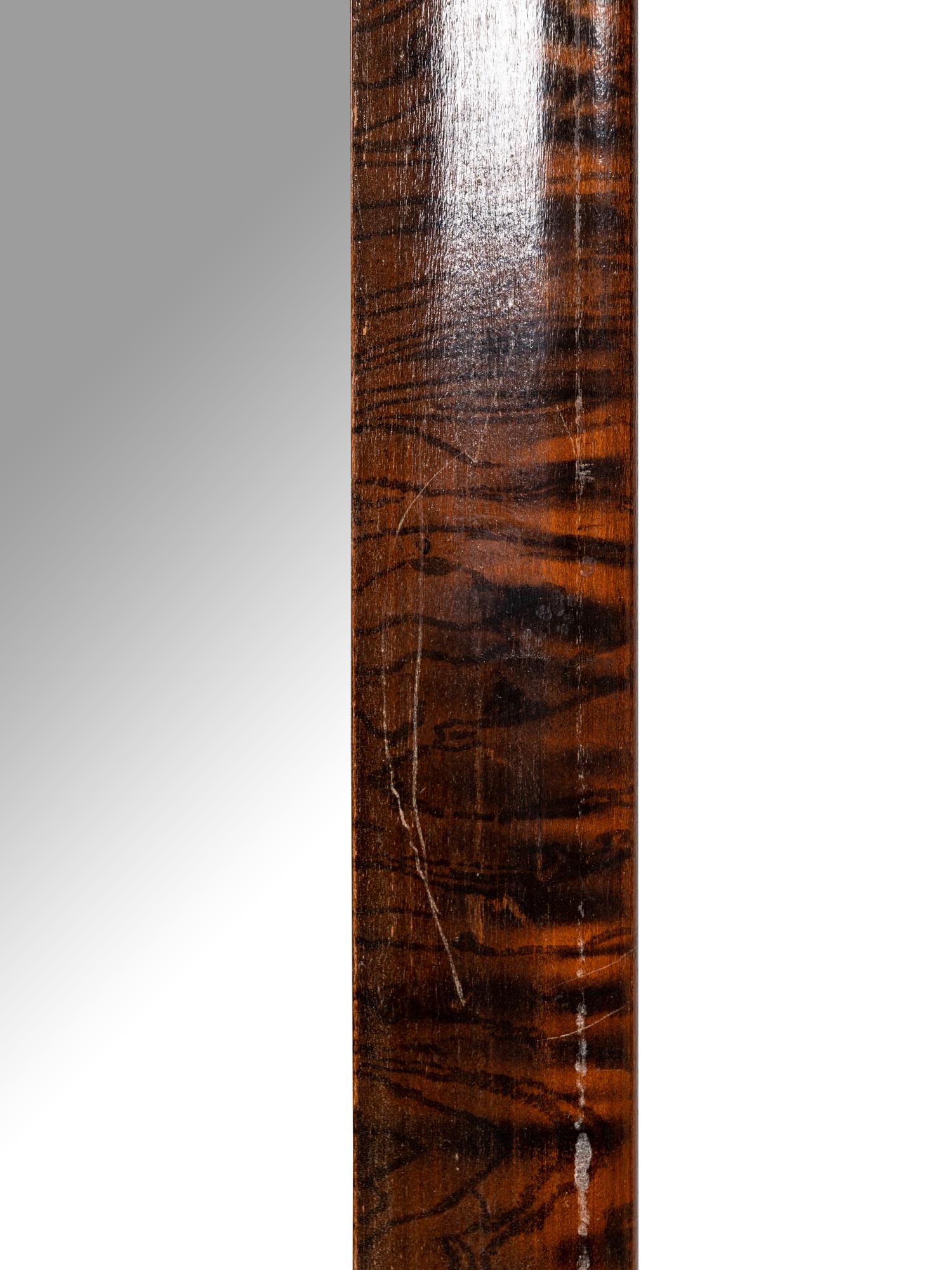 A Continental Burlwood Mirror