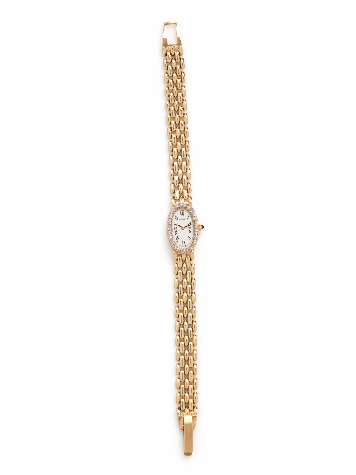 SEIKO, 14K YELLOW GOLD AND DIAMOND WATCH