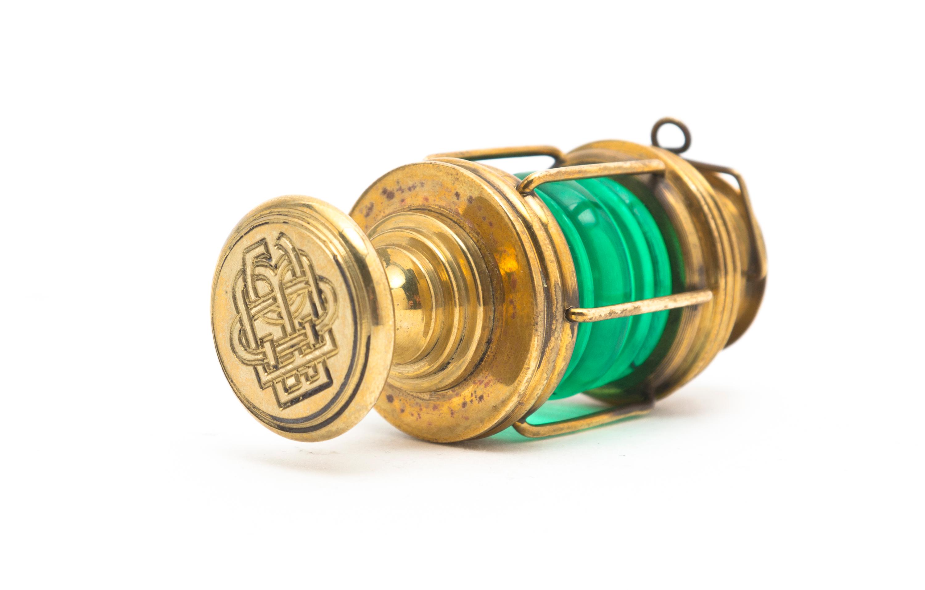 A Brass and Glass Seal, Height over handle 3 1/8 inches.