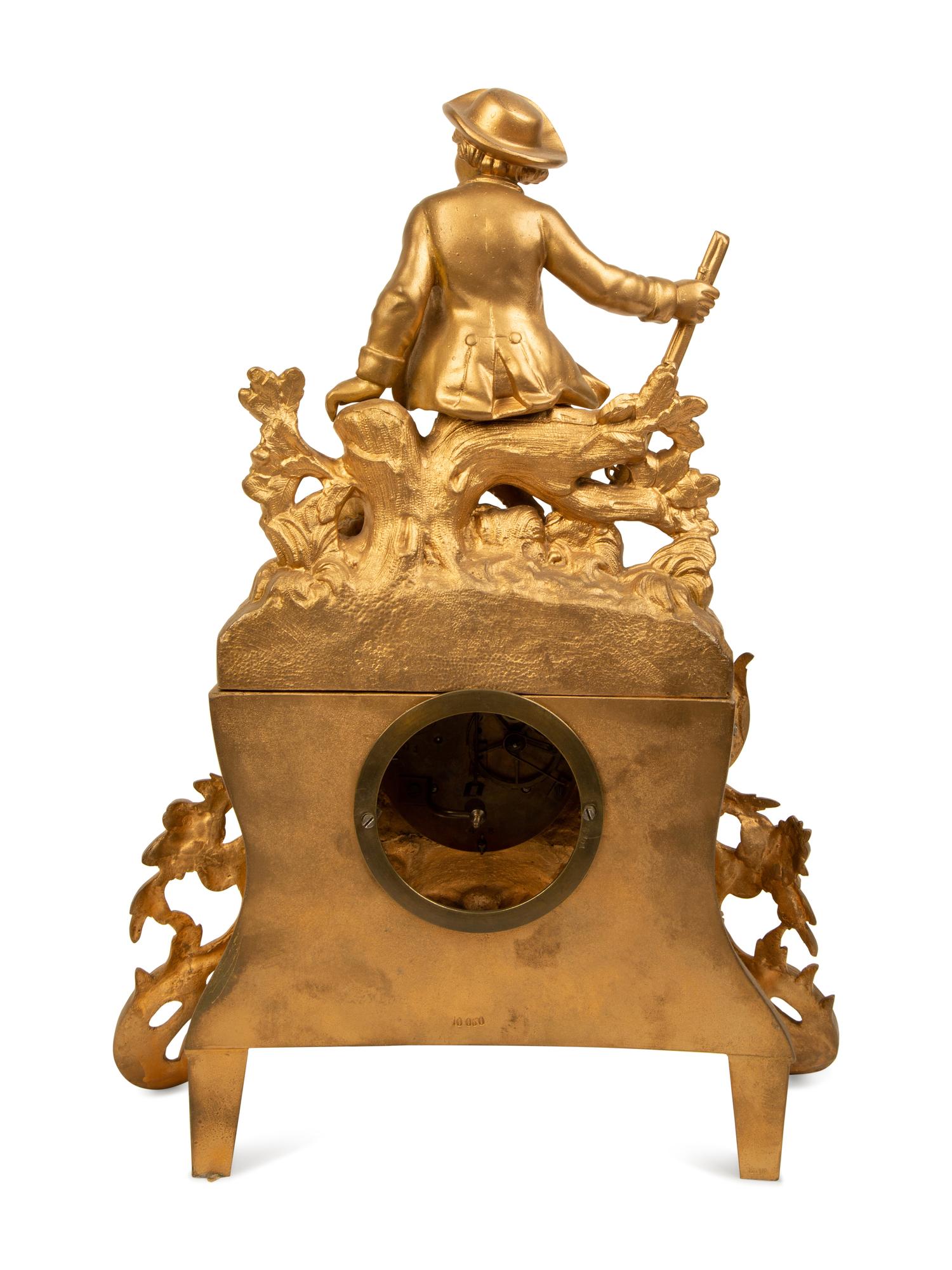 A French Gilt Metal Figural Clock — LATE 19TH CENTURY