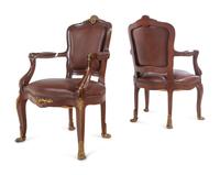 A Set of Fourteen Louis XV Style Gilt Bronze Mounted Walnut Dining Chairs