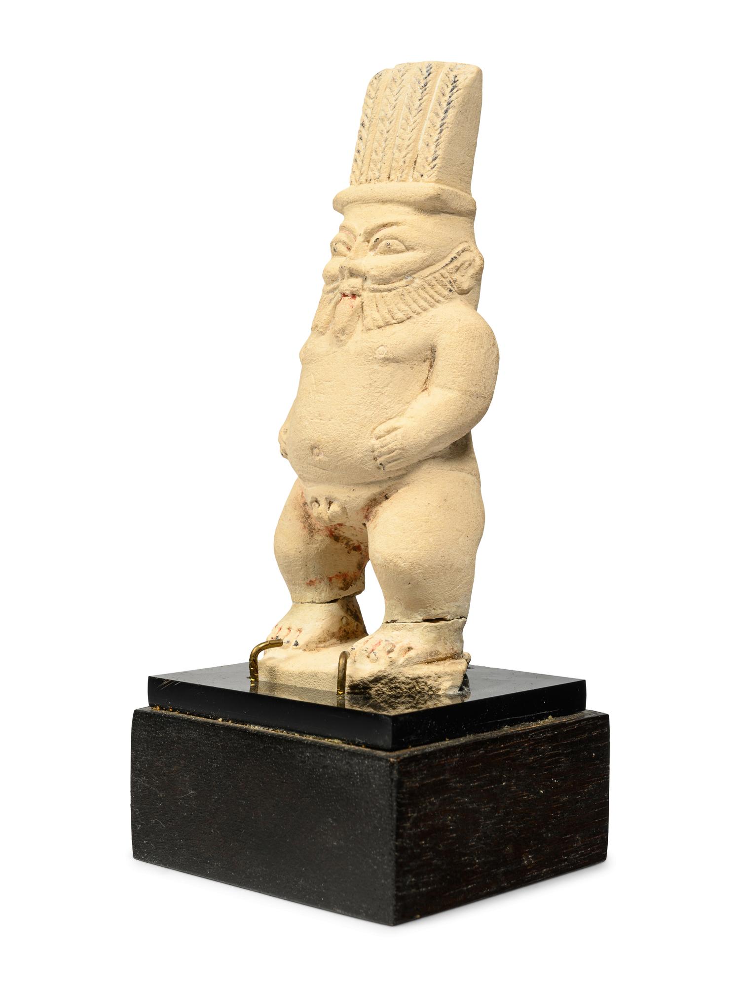 An Egyptian Painted Limestone Bes