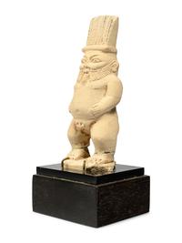 An Egyptian Painted Limestone Bes