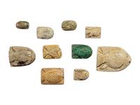 Ten Egyptian Faience Fish Beads with Hieroglyphs