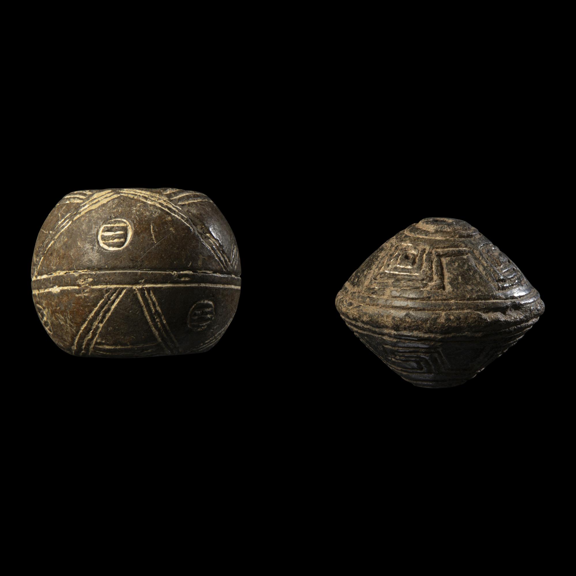 Two Anglo-Saxon Terracotta Spindle Whorls