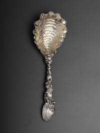 An American Parcel Gilt Silver Serving Spoon