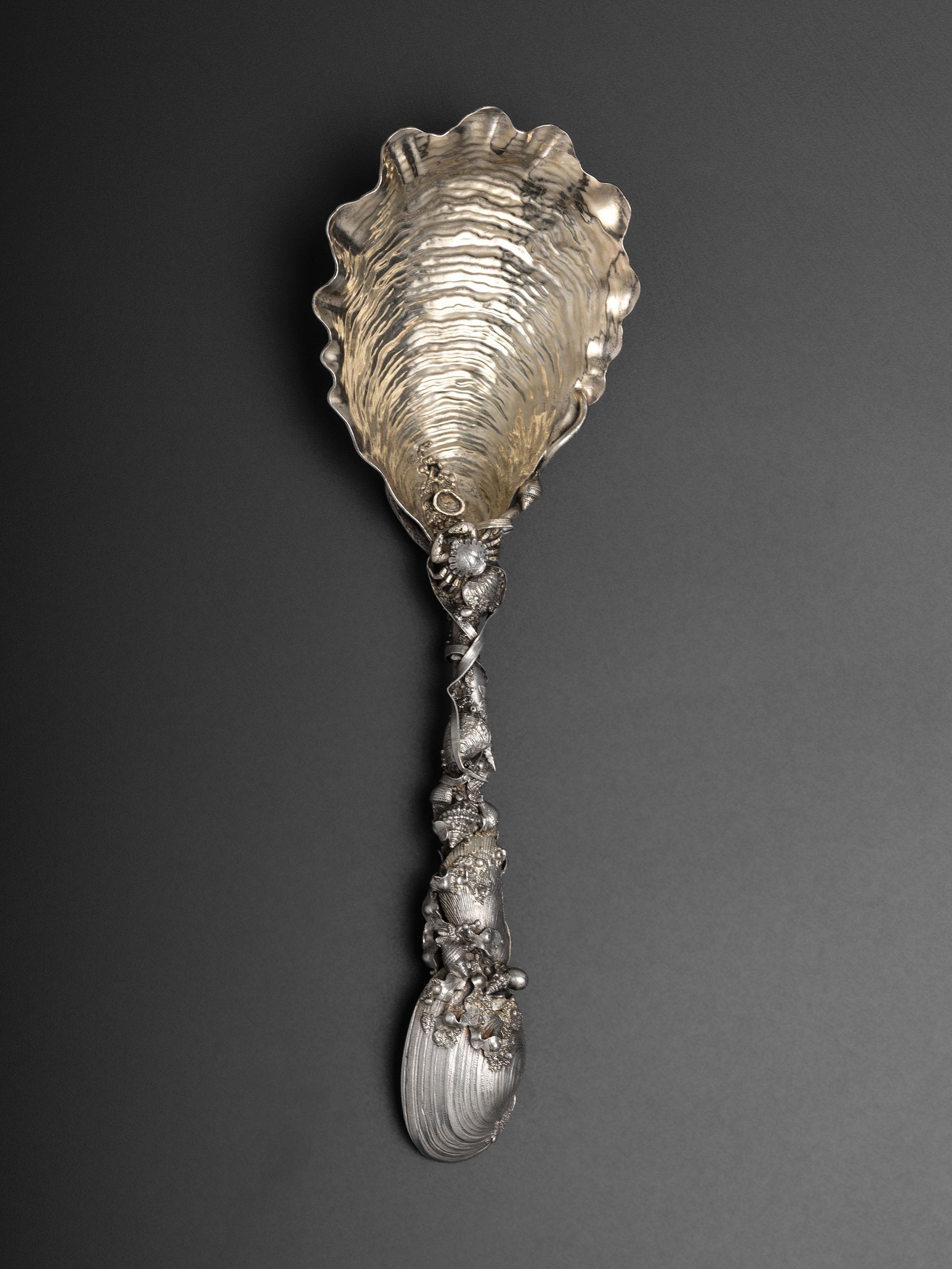 An American Parcel Gilt Silver Serving Spoon