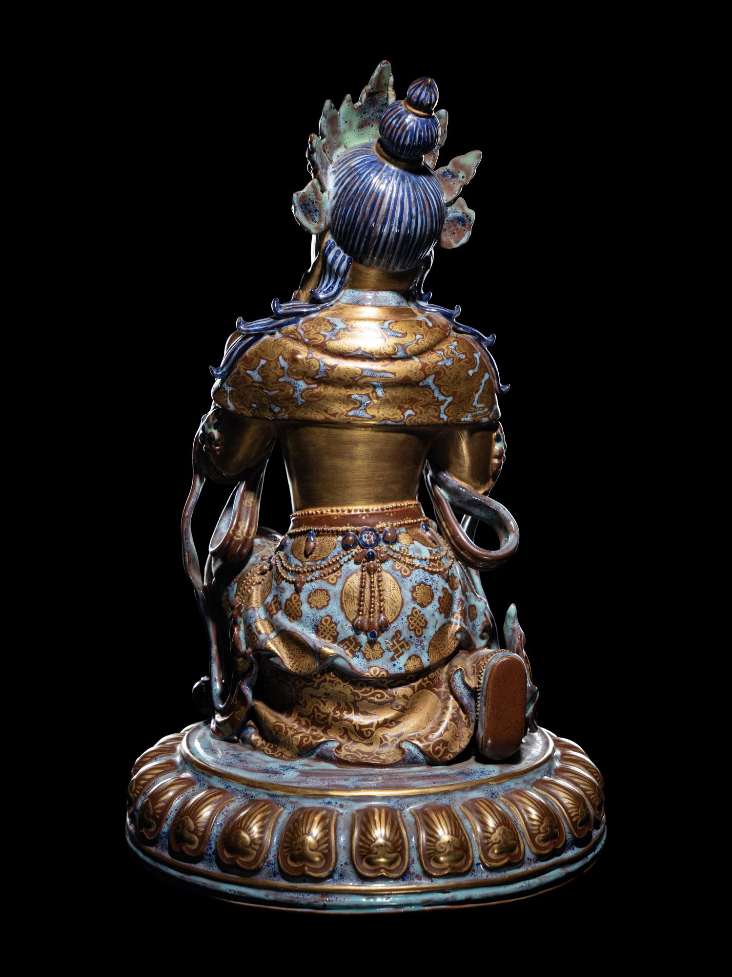 A Gilt Decorated Robin's Egg Glazed Porcelain Figure of Guanyin