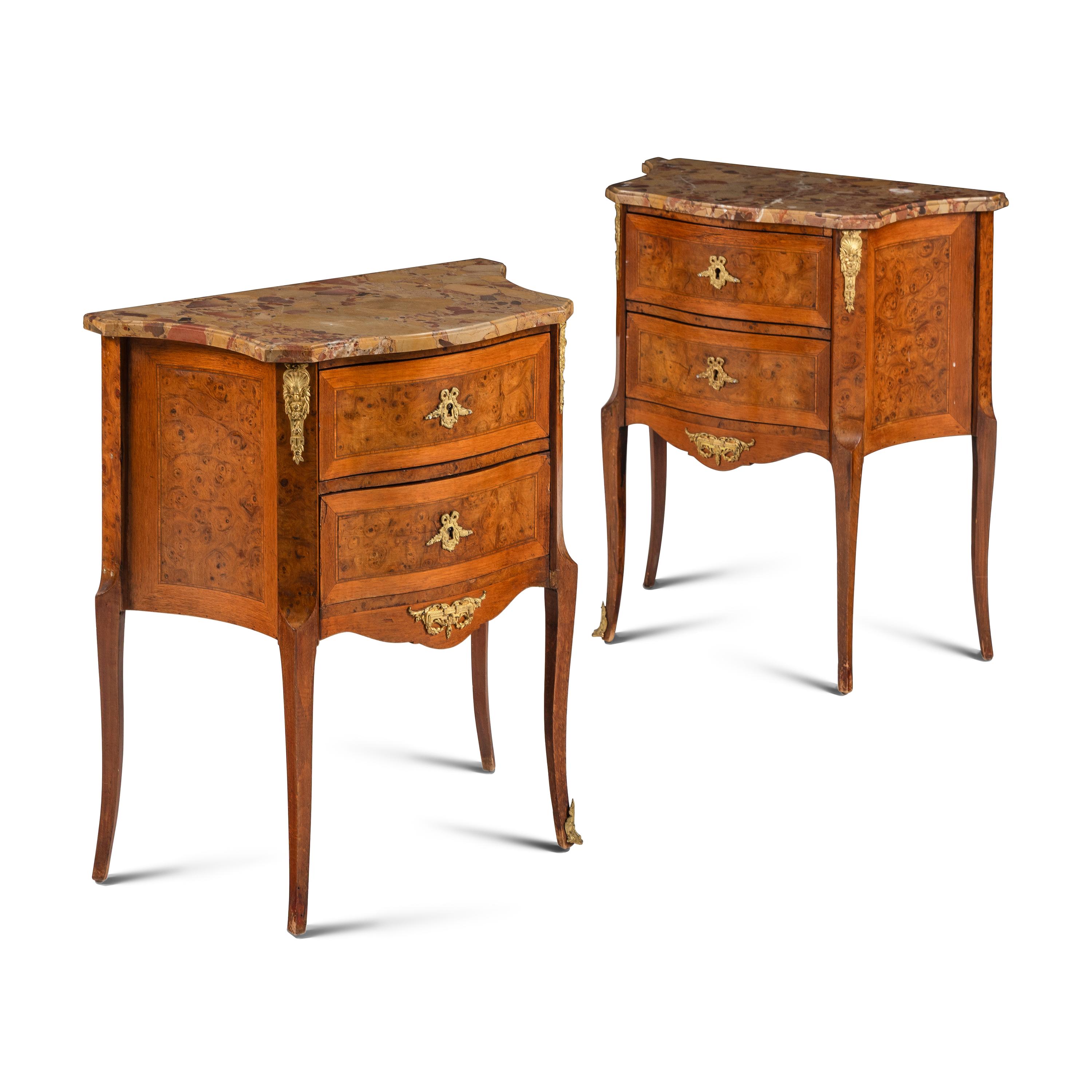 A Pair of Louis XV/XVI Transitional Style Gilt Bronze Mounted Walnut and Marble-Top Commodes