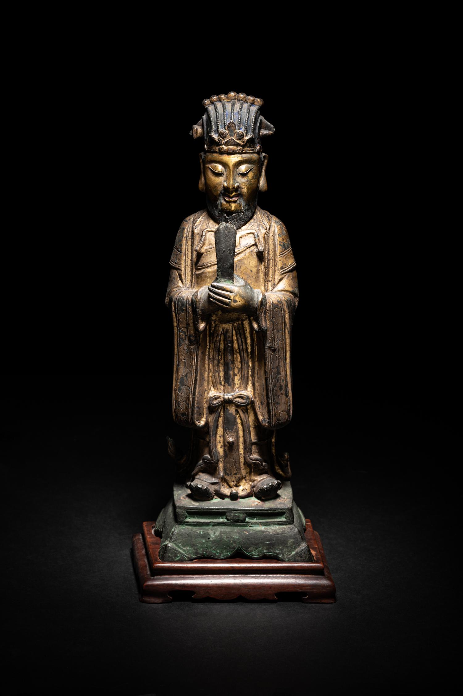A Pair of Chinese Gilt Decorated Bronze Figures of Standing Officials