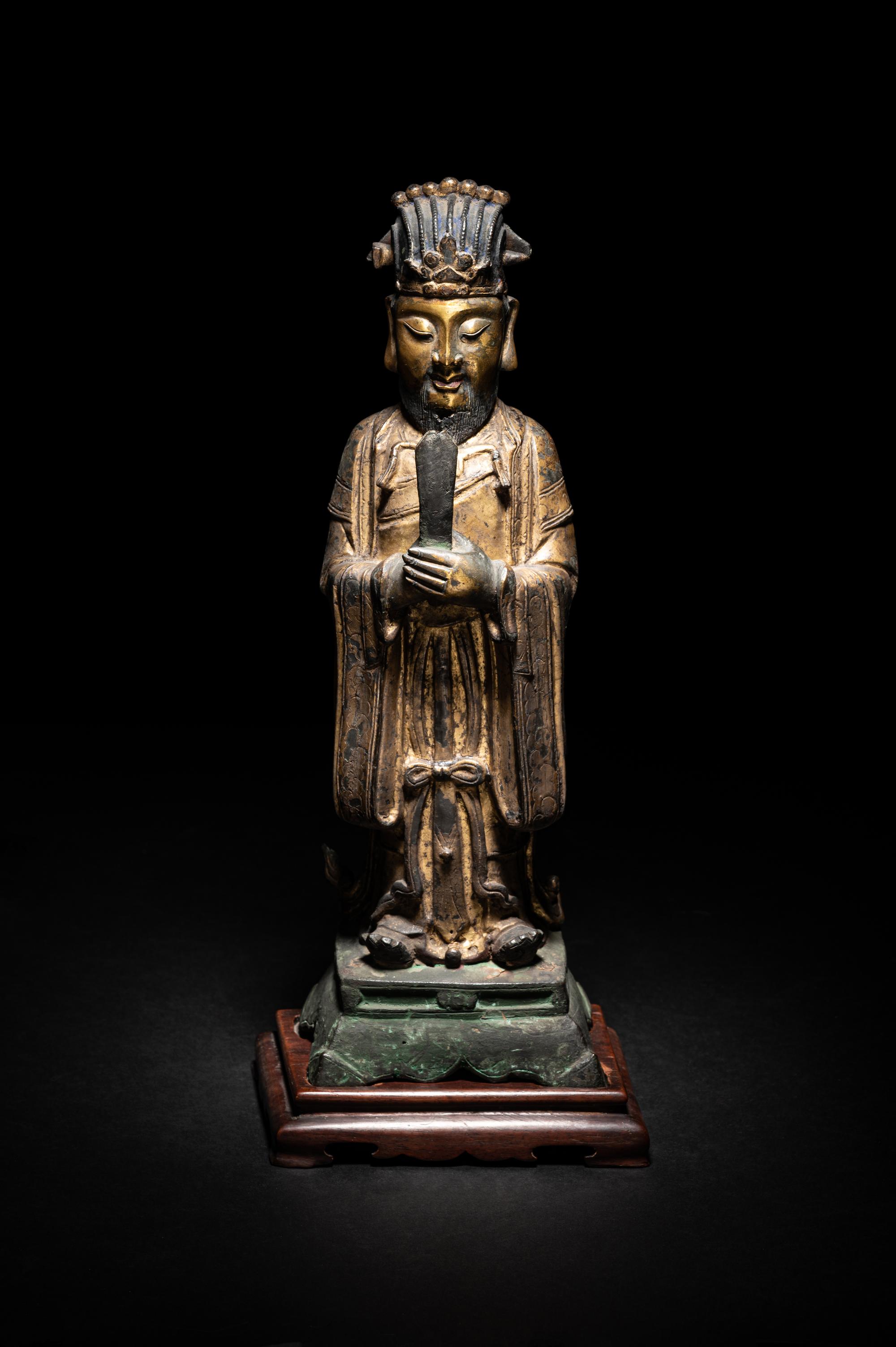 A Pair of Chinese Gilt Decorated Bronze Figures of Standing Officials