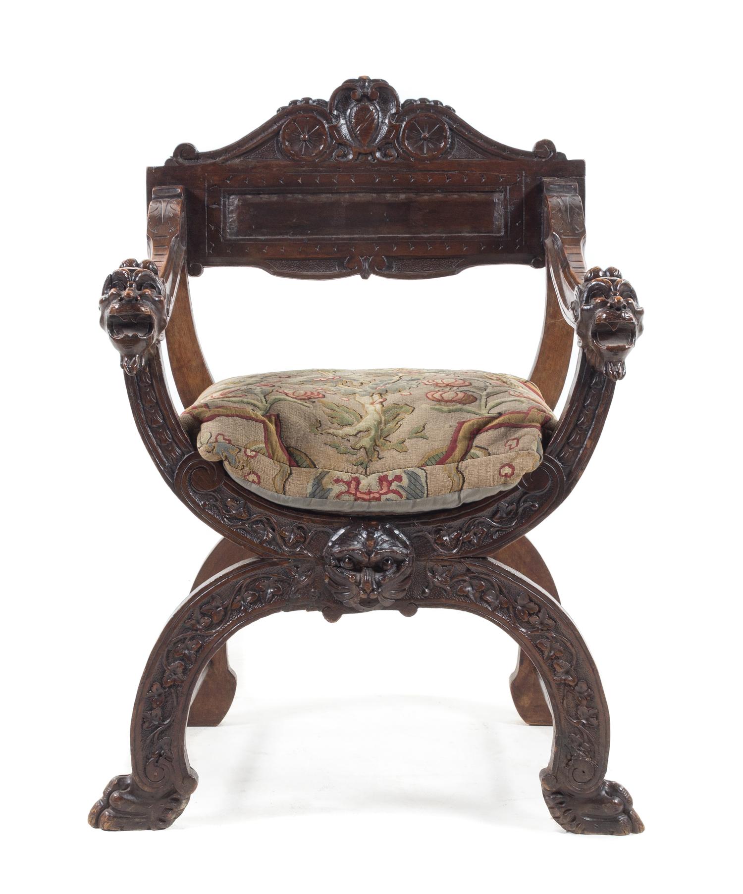 An Italian Walnut Savonarola Chair Height 38 inches. — LATE 19TH CENTURY