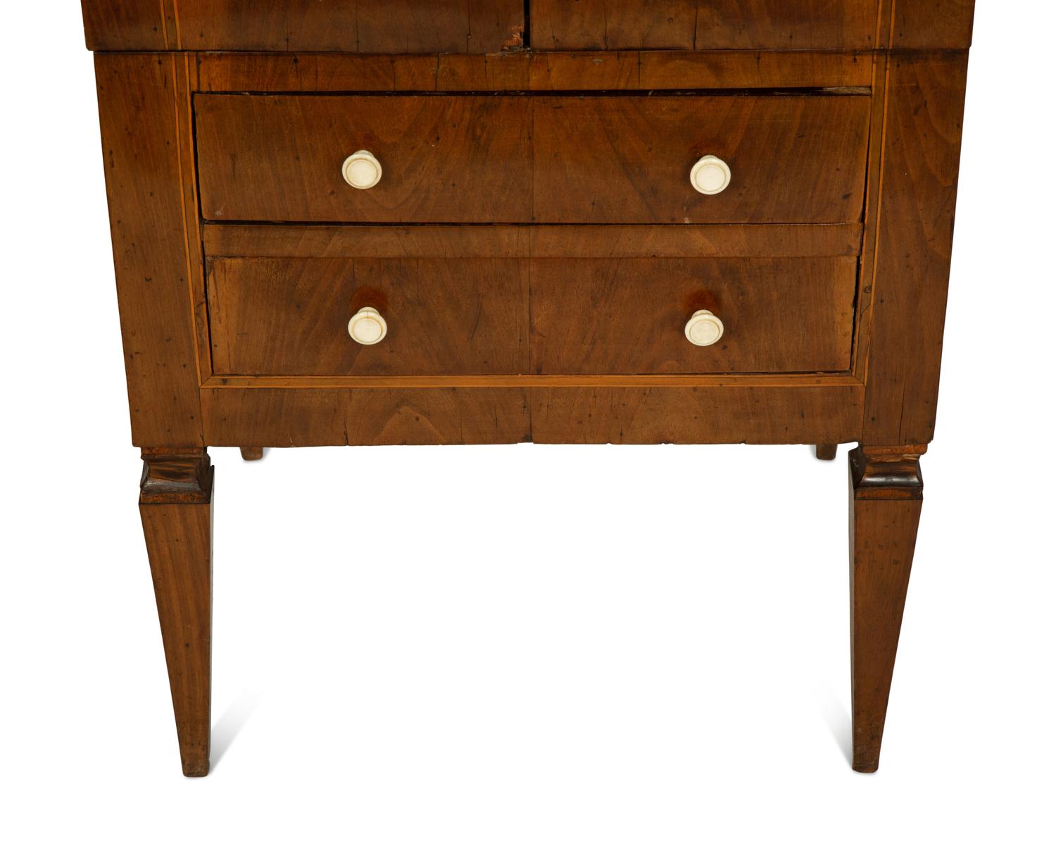 An Italian Walnut Commodino