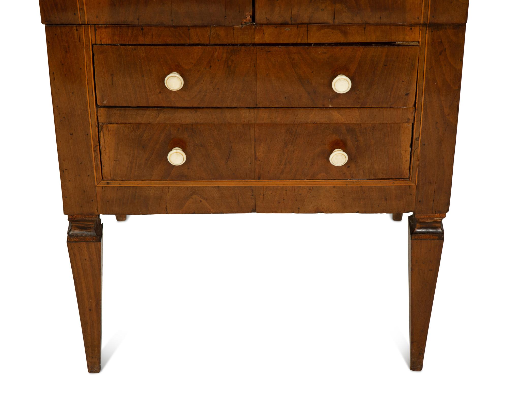 An Italian Walnut Commodino