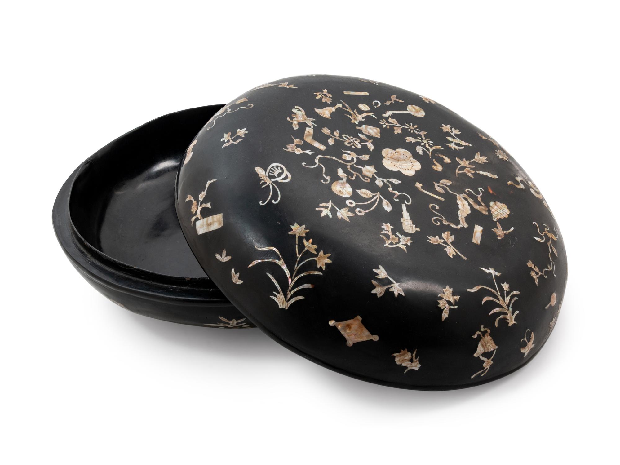 Two Chinese and Japanese Mother-of-Pearl Inlaid Black Lacquer Covered Boxes