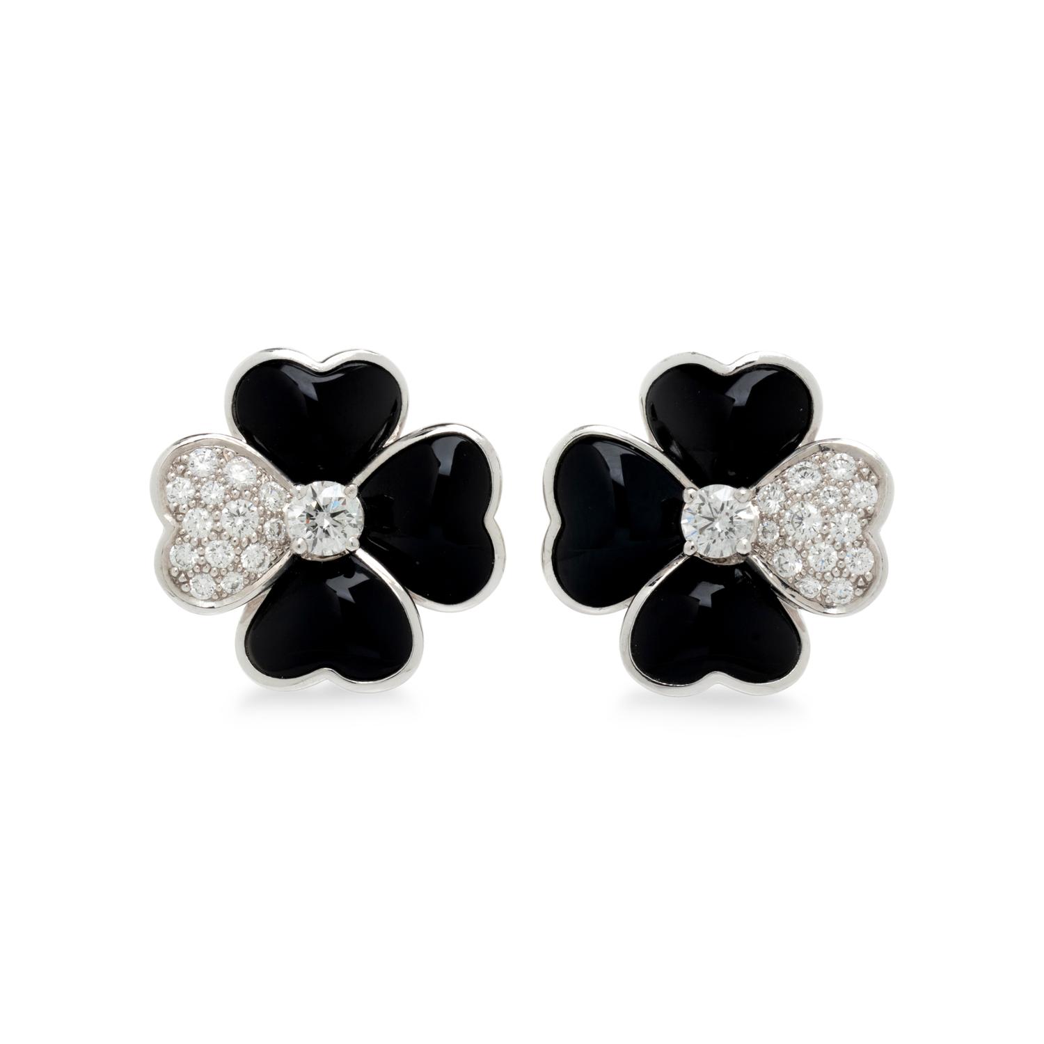 VAN CLEEF & ARPELS, DIAMOND, ONYX, AND WHITE GOLD 'COSMOS' CLIP EARRINGS