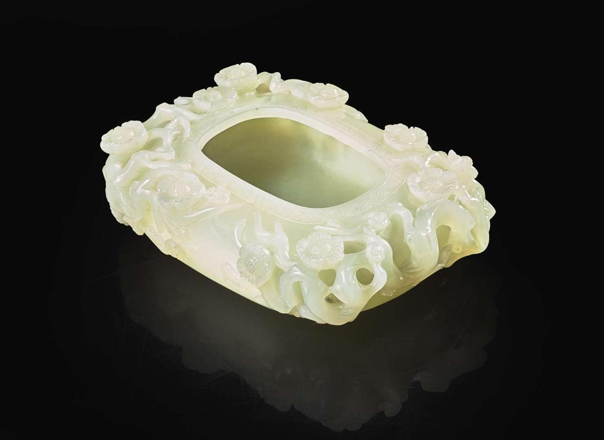 A Chinese carved pale celadon jade "Prunus" brush washer 青白玉梅花筆洗