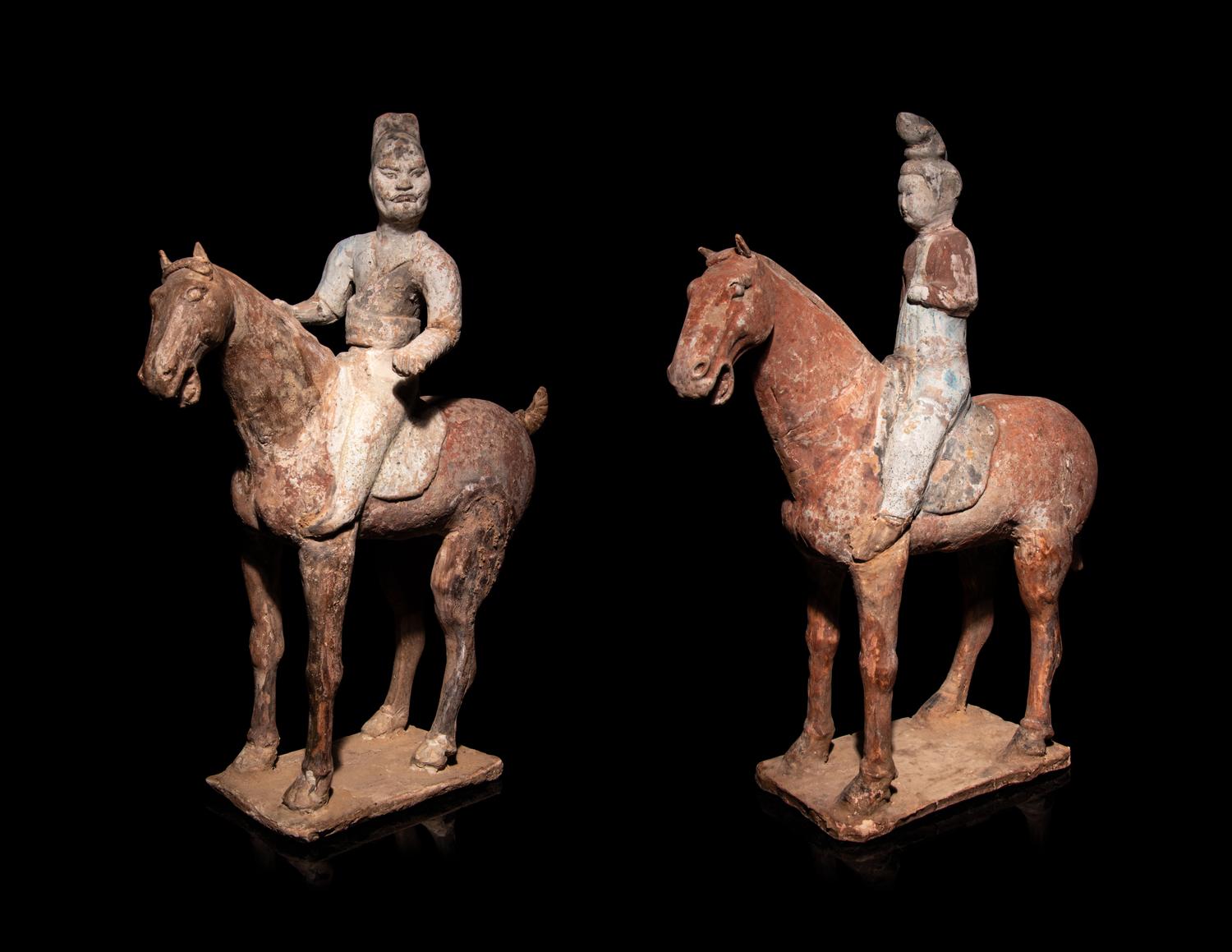 A Pair of Chinese Pottery Equestrian Figures
