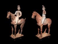 A Pair of Chinese Pottery Equestrian Figures