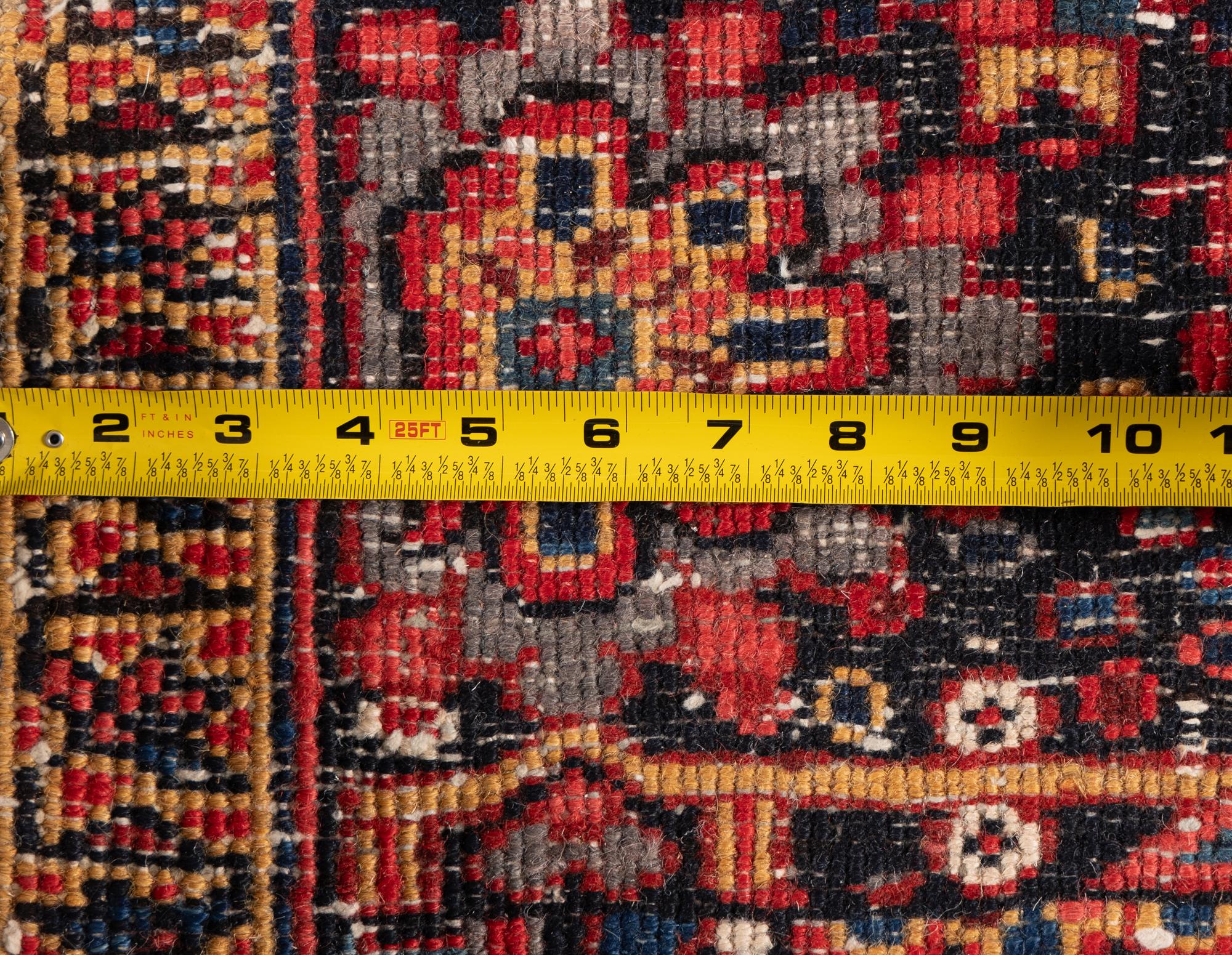 A Heriz Wool Rug