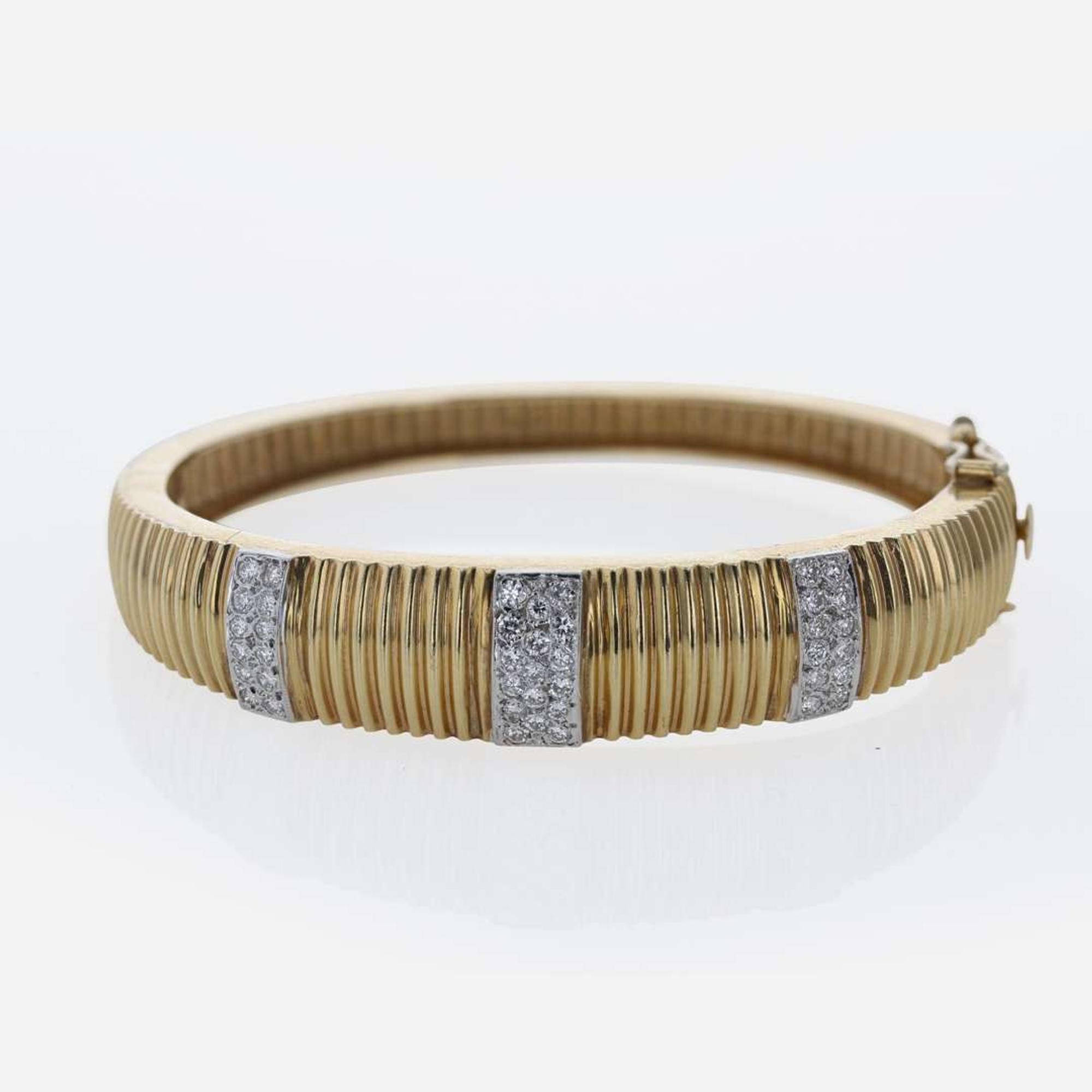 A 14K Yellow Gold and Diamond Bracelet