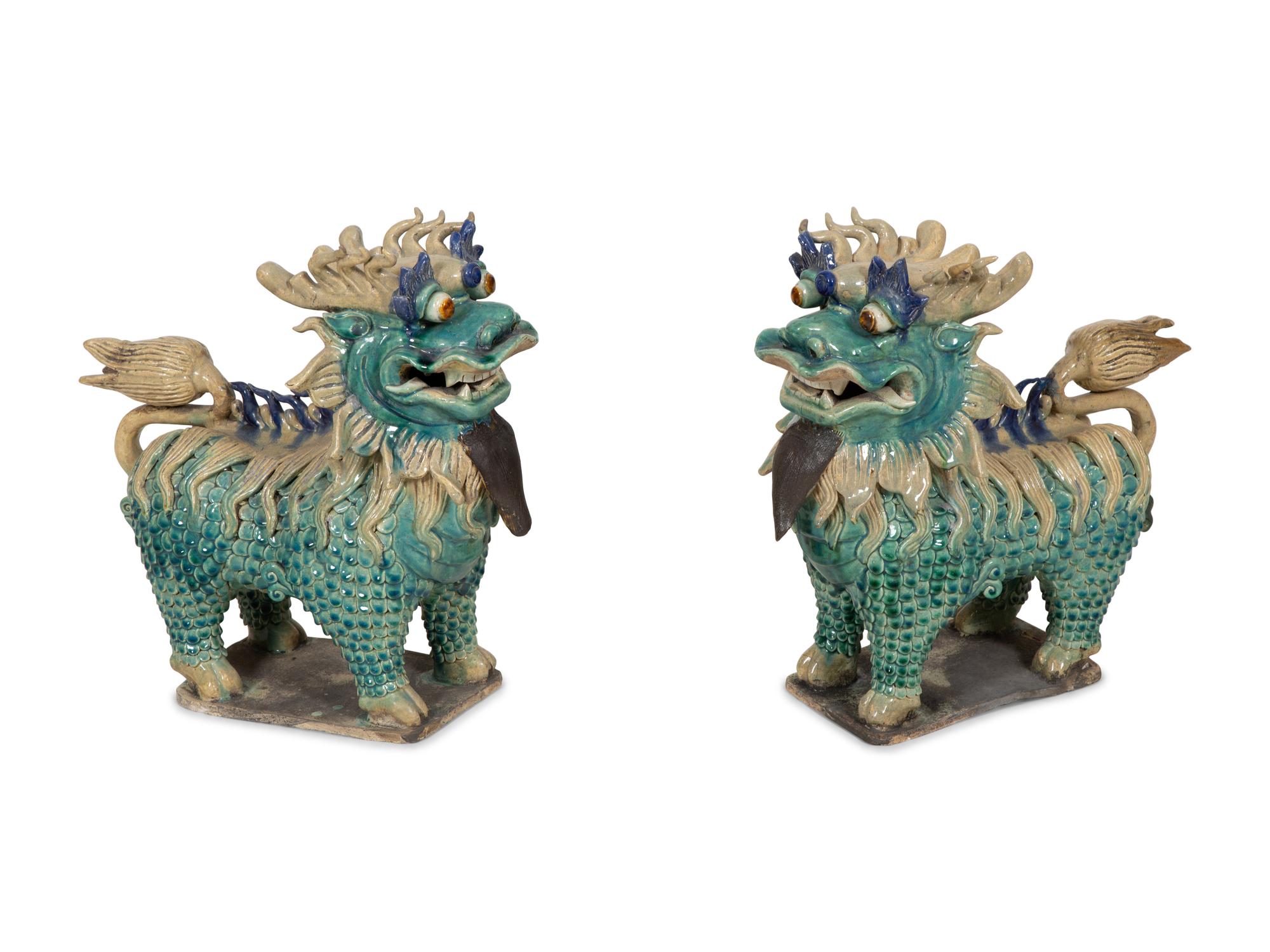 A Pair of Chinese Glazed Ceramic Dragons
