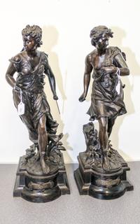 A Pair of Continental Cast Metal Figures Height 24 inches. — 19TH CENTURY