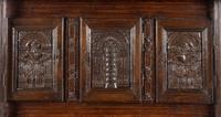 A Jacobean Carved Oak Cupboard