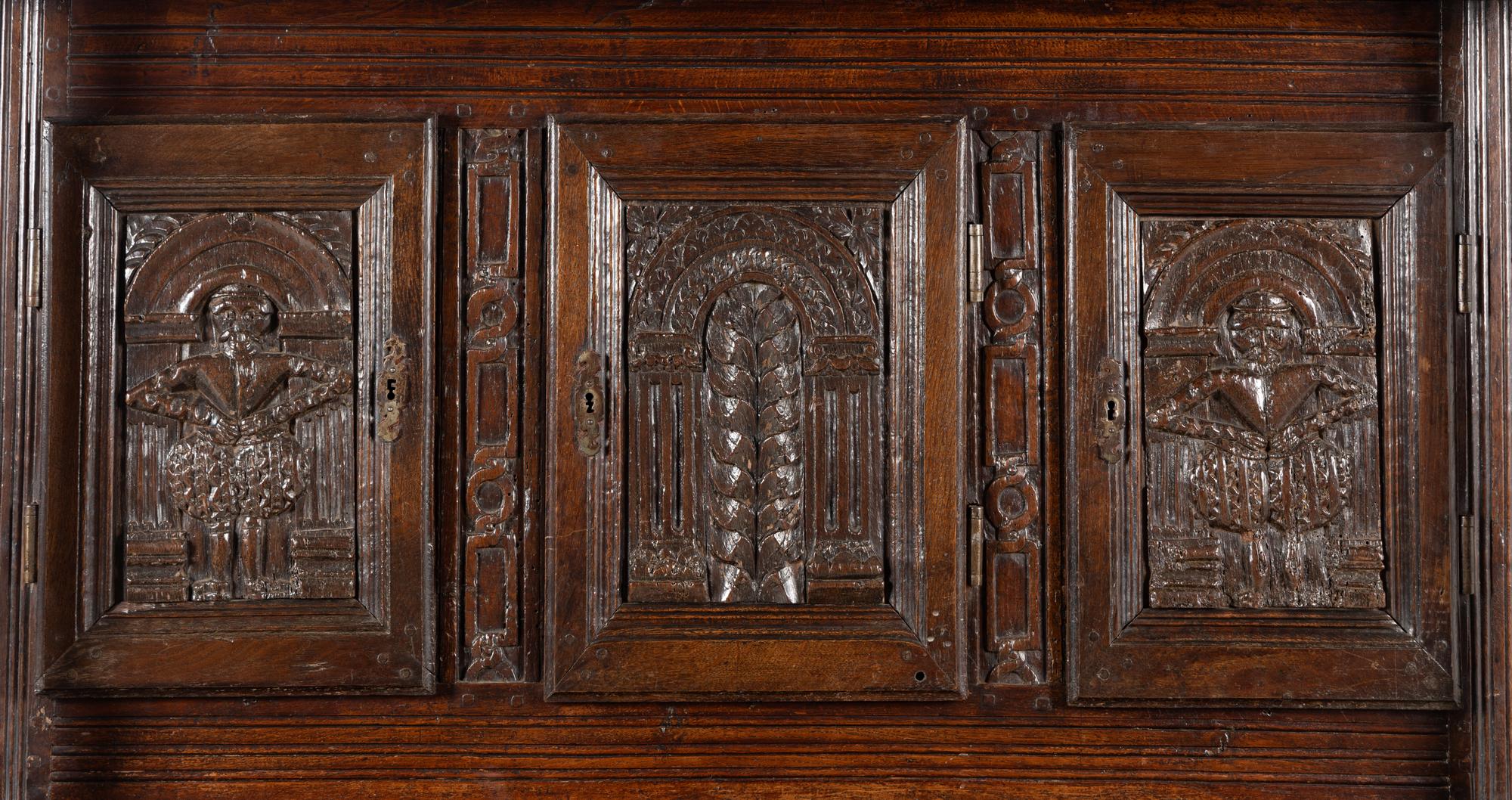 A Jacobean Carved Oak Cupboard