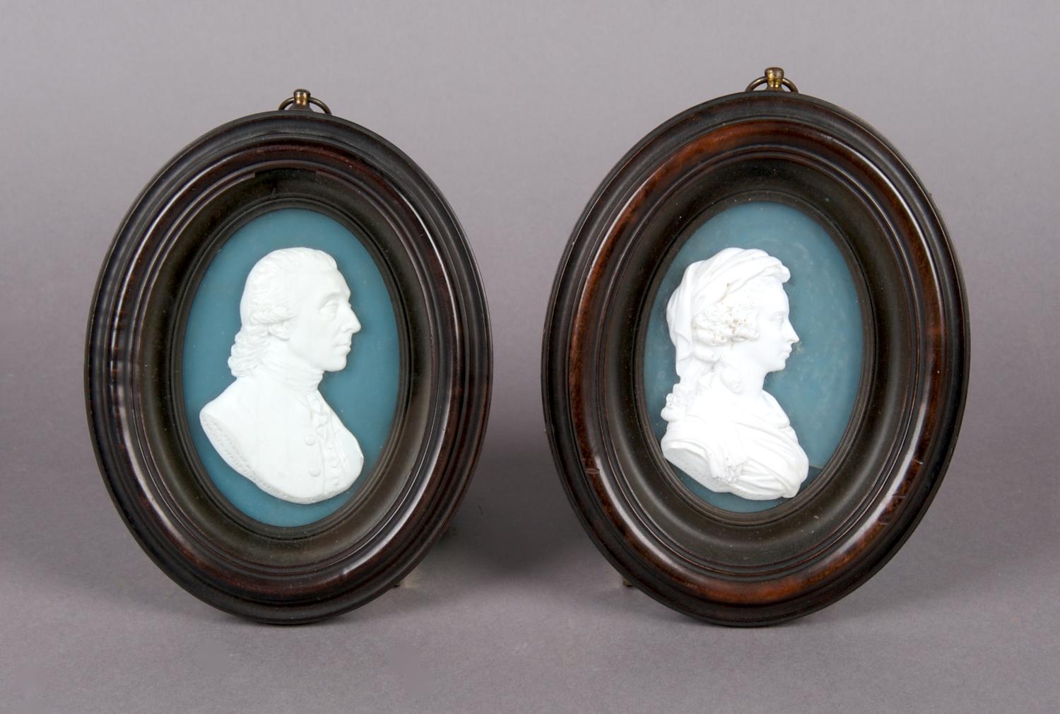 A Group of Two Scottish Glass Paste Portrait Medallions, Tassie, Height of frames 5 3/4 inches.