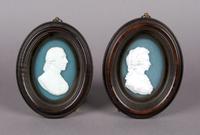 A Group of Two Scottish Glass Paste Portrait Medallions, Tassie, Height of frames 5 3/4 inches.