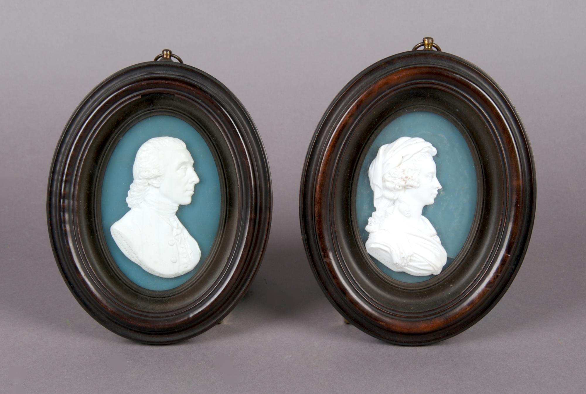 A Group of Two Scottish Glass Paste Portrait Medallions, Tassie, Height of frames 5 3/4 inches.