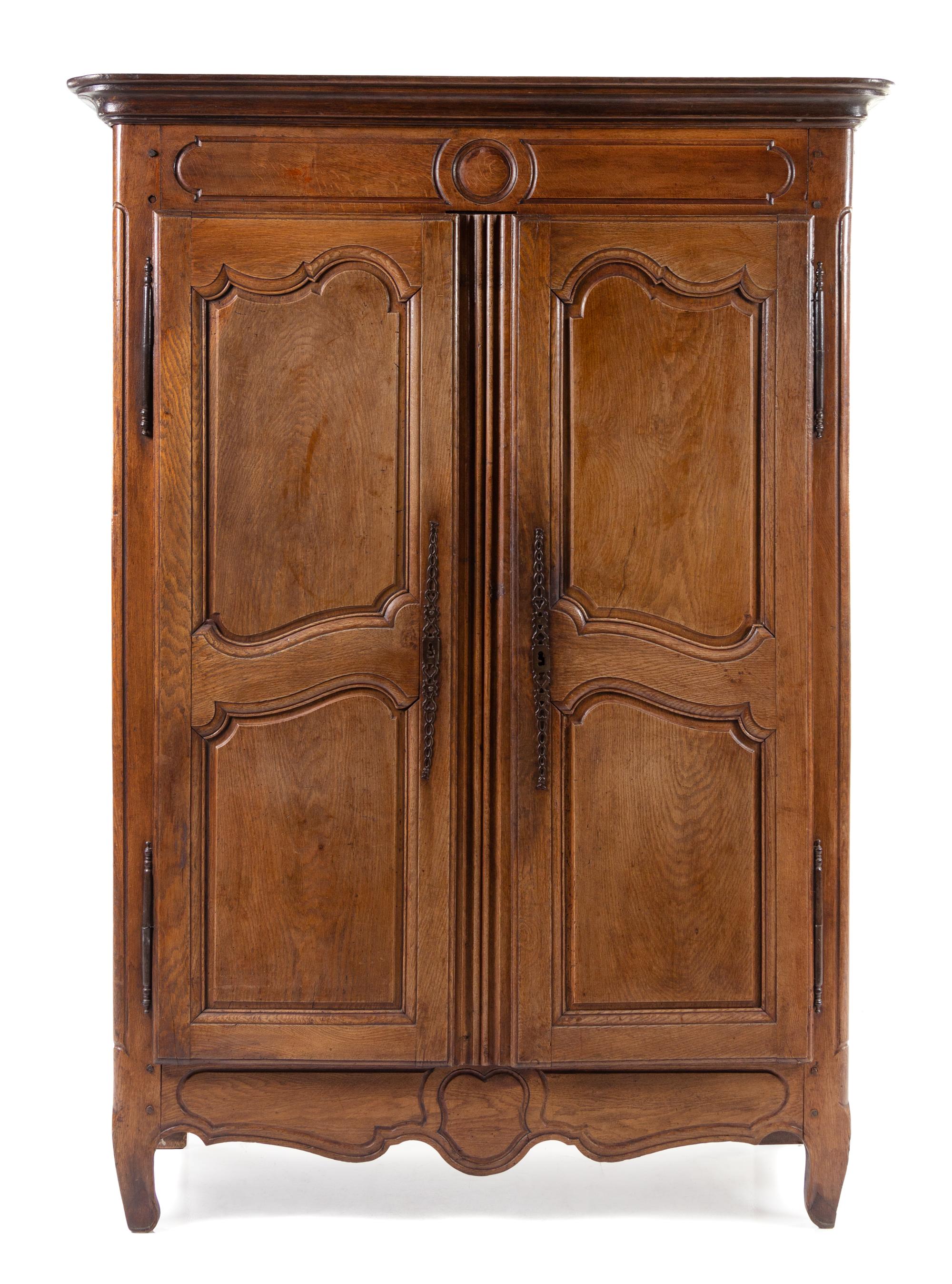 A Louis XV Provincial Walnut Armoire Height 77 x width 51 1/2 x depth 19 inches. — LATE 18TH CENTURY