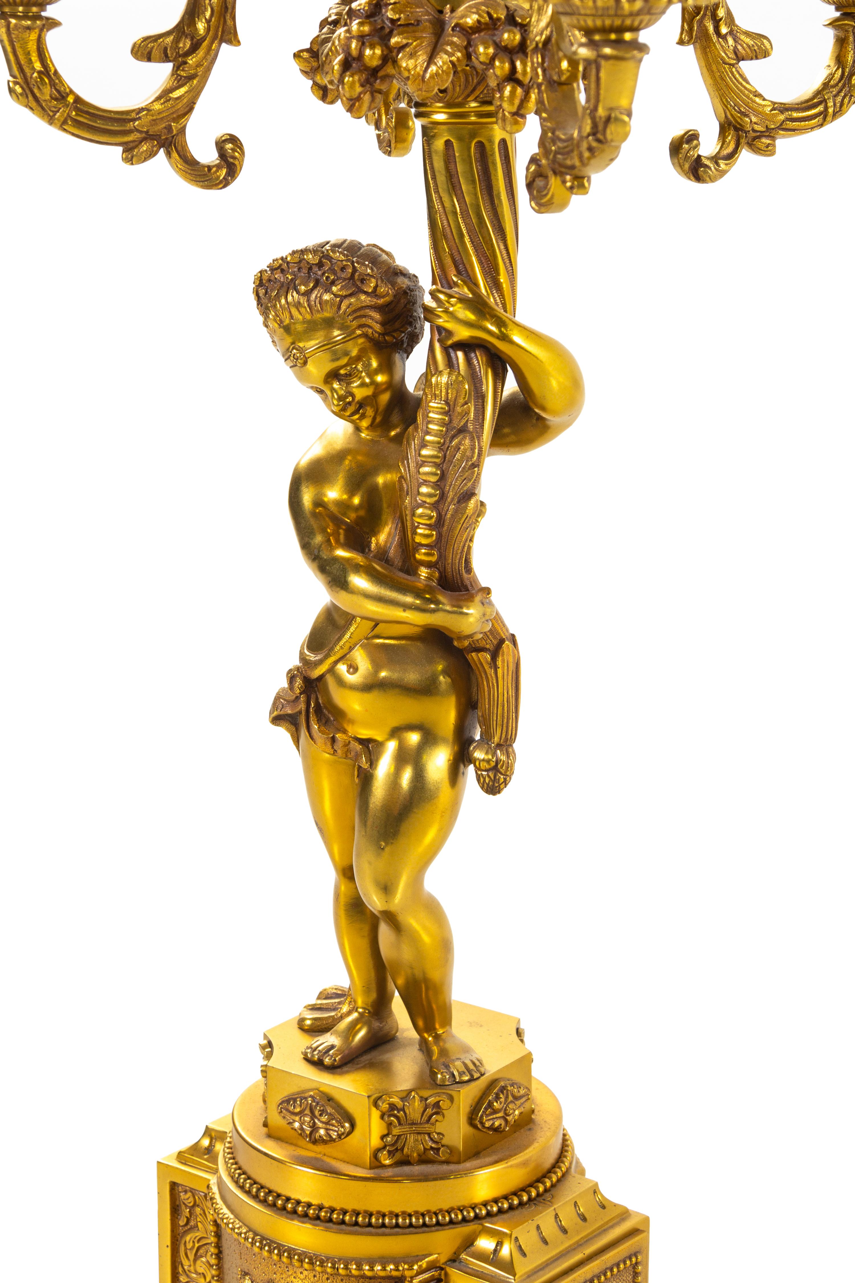 A French Gilt Bronze Figural Nine-Light Candelabrum