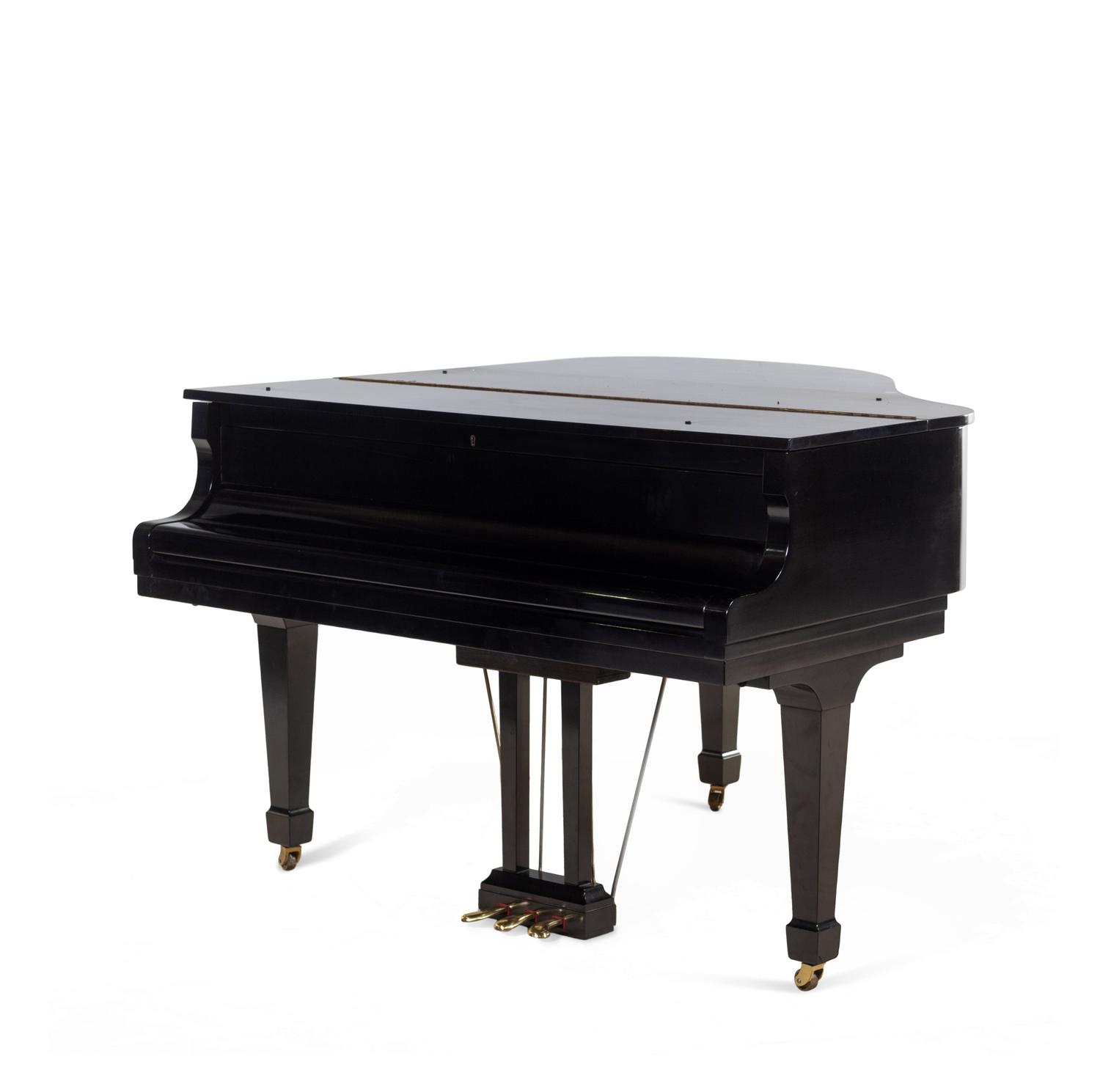 A Kawai Black Lacquered Baby Grand Piano